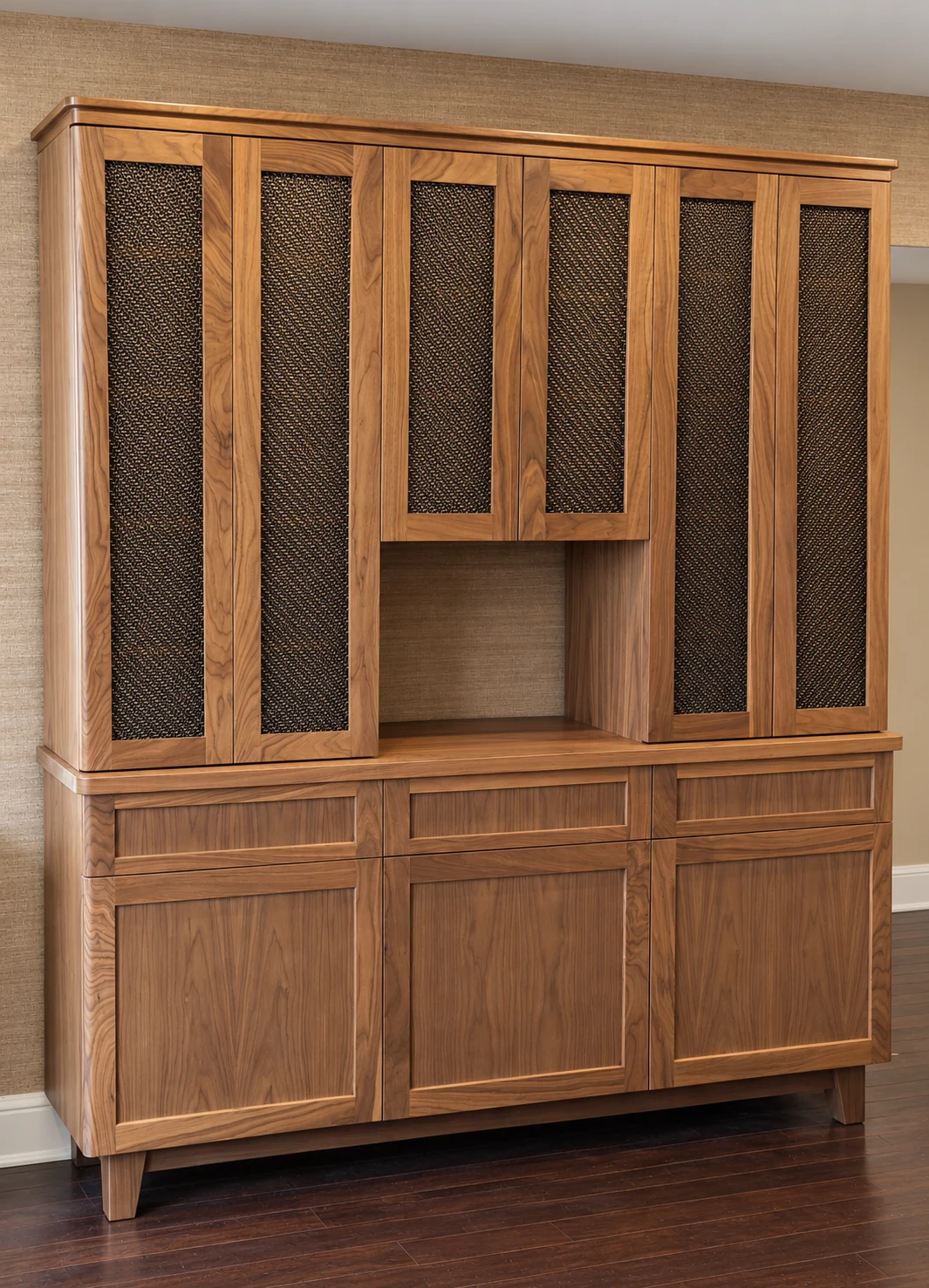 Lenox Hill walnut cabinet with tall mesh-panel doors, a central open niche, paneled lower storage and drawers